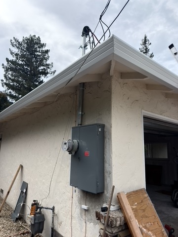 Exterior main panel and overhead service equipment.